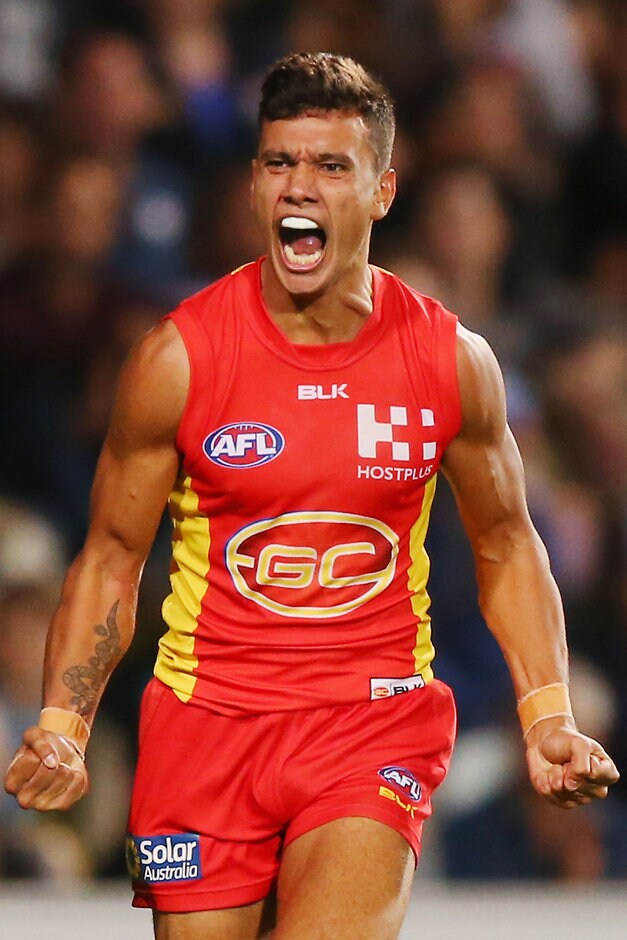 AFL 2016 Rd 17 - Western Bulldogs v Gold Coast Suns CAIRNS, AUSTRALIA - JULY 16: Callum Ah Chee of the Suns celebrates a goal during the round 17 AFL match between the Western Bulldogs and the Gold Coast Suns at Cazaly's Stadium on July 16, 2016 in Cairns, Australia. (Photo by Michael Dodge/Getty Images/AFL Media)